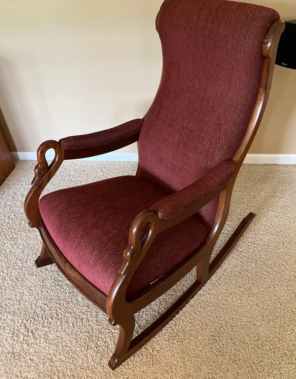 Antique Victorian swan-arm rocking chair reupholstered by Perrin's in rich burgundy woven chenille, polished wood frame